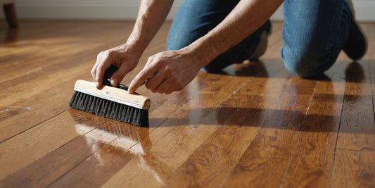 Applying polyurethane finish to wooden floor